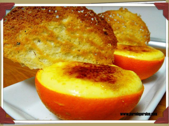 Naranjas rellenas de crema de naranja y crujiente de almendra